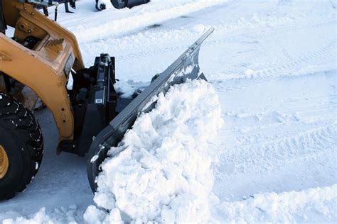 largest skid steer for snow plowing|snow plow angle pusher.